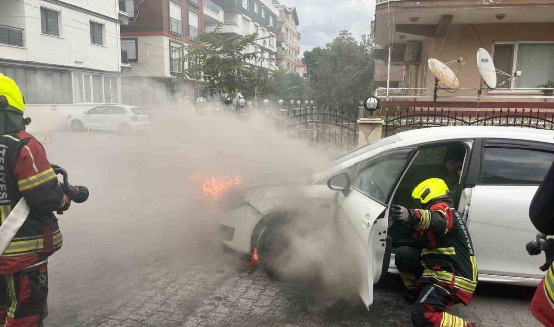 Balıkesir’in Burhaniye ilçesinde cadde üzerinde aniden alev alan otomobil, itfaiye