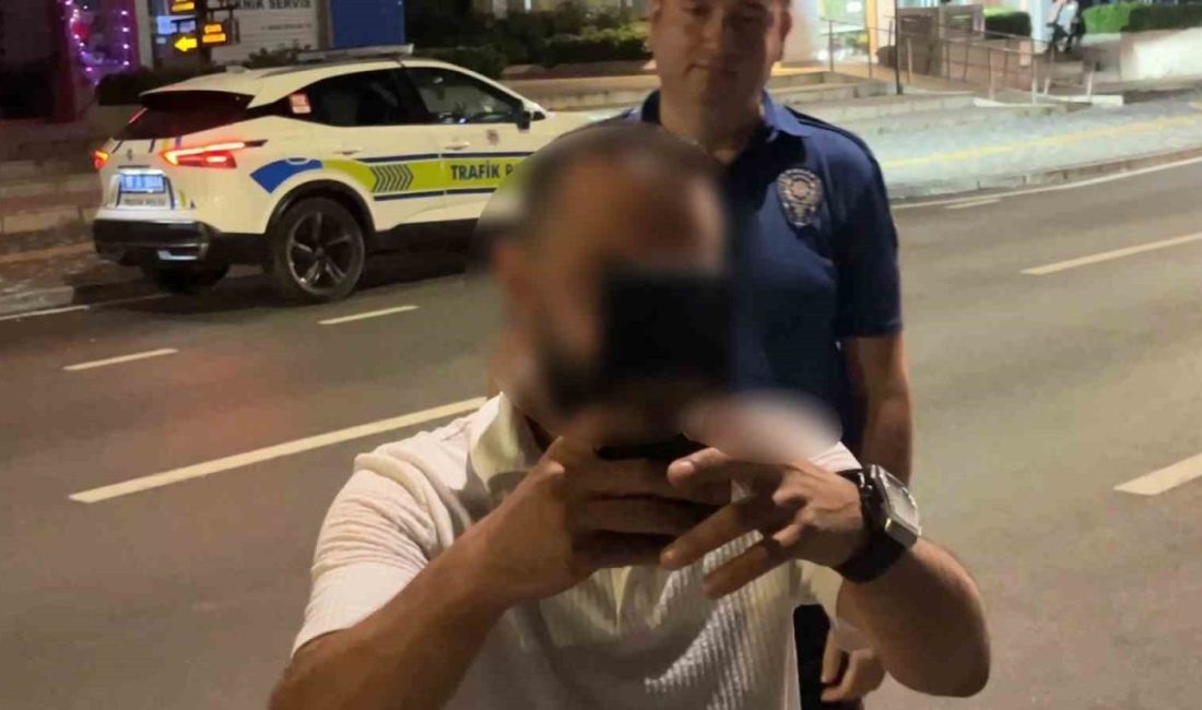 Bursa’da alkol denetimine takılan sürücü, görevini yapan basın mensubunu görünce