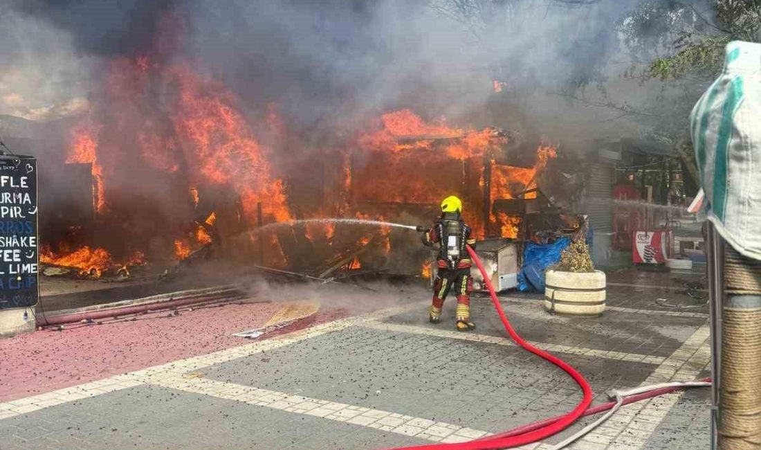 Balıkesir’in Edremit ilçesinde birbirine bitişik iş yerlerinde çıkan yangın, itfaiye